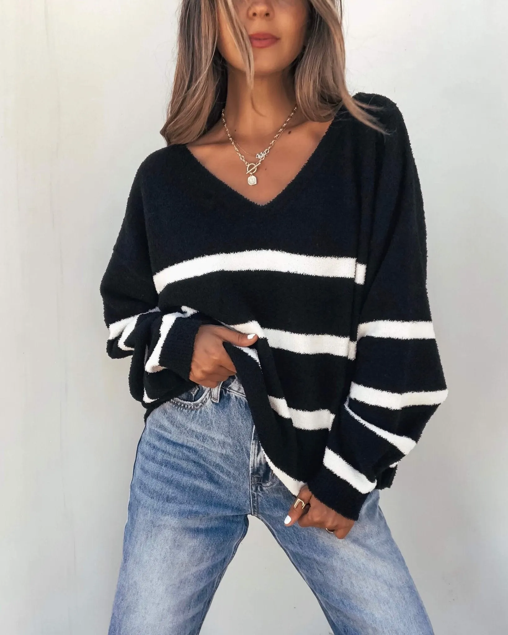 Black and White Striped V Neck Sweater